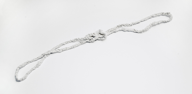 Allison Manch, Loop, 2012, braided and tied cotton fabric with embellishments, overall 36 inches.