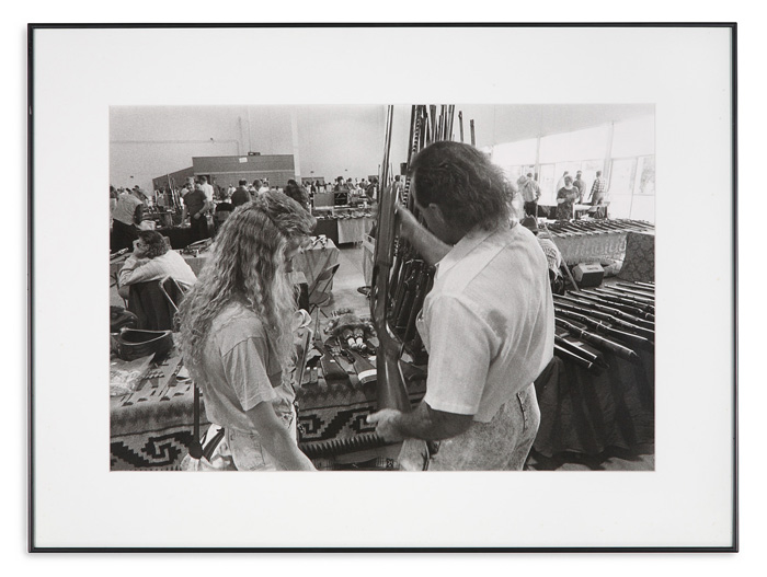 Glenn Rudolph, Boise Gun Show, 1992, silver print, 12 x 18 inches.