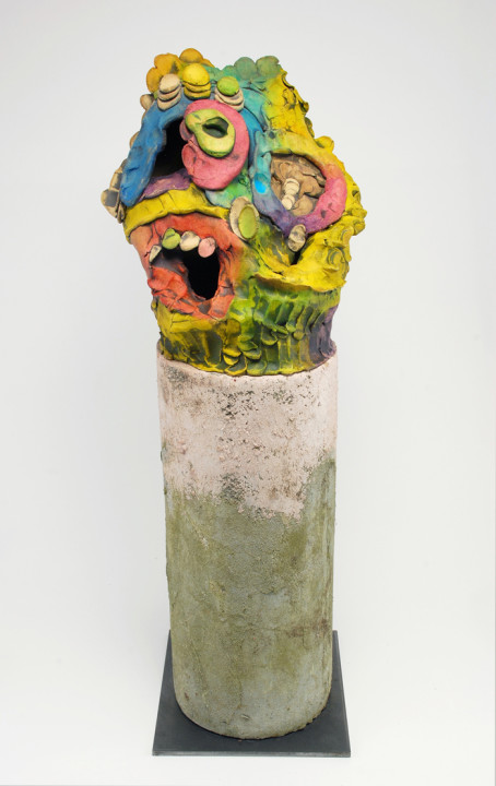Luke Armitstead, Rainbow Head, 2017, glazed and painted earthenware on concert and metal base, 20 x 7 x 7 inches.